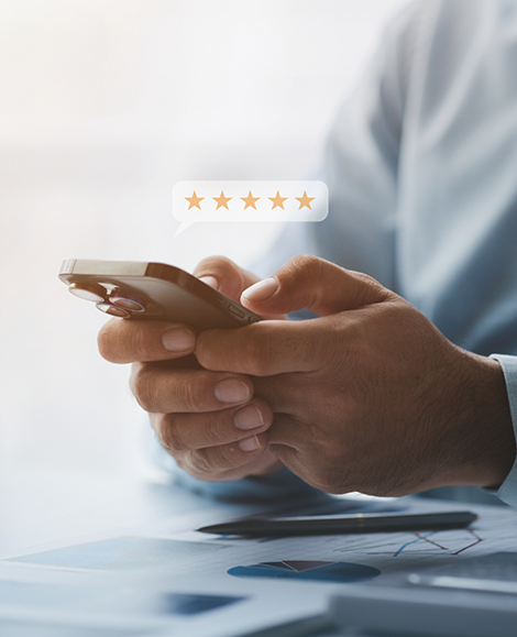 Man leaving 5 star review on phone